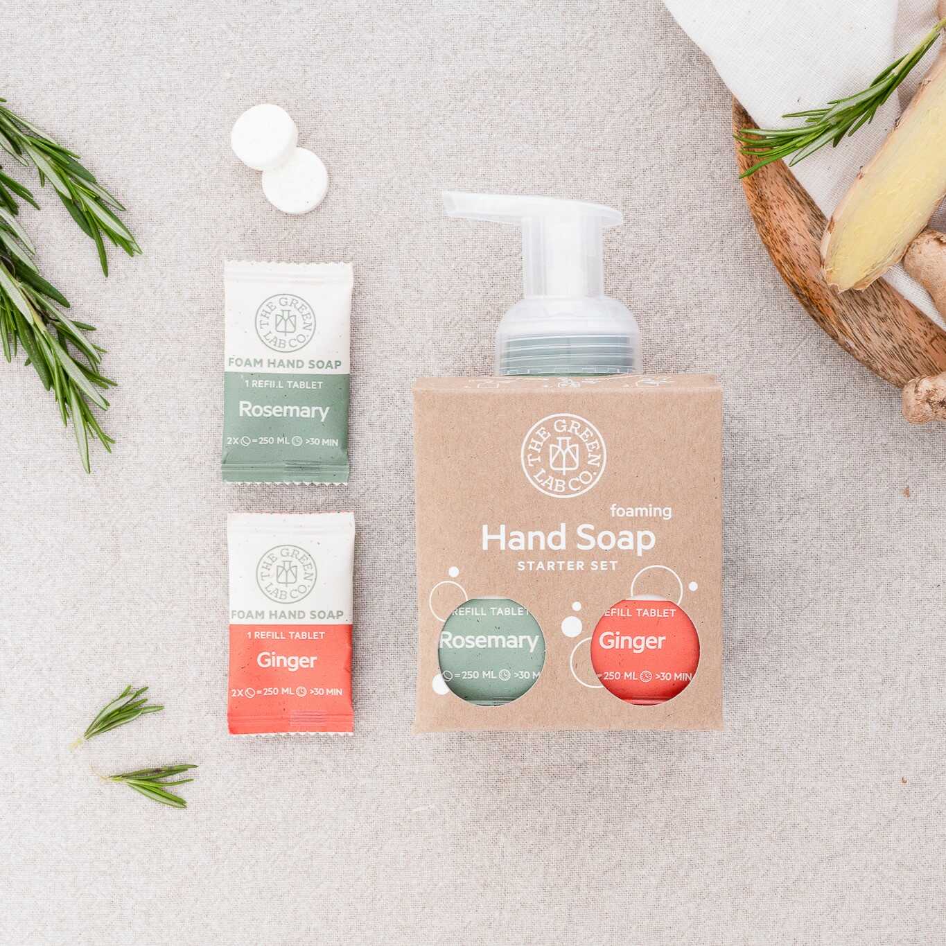 The Green Lab Co Foaming Hand Soap Starter Set — dispenser with Rosemary & Ginger refill tablets.